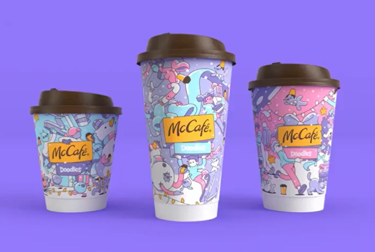 Картинка McDonald’s украсил стаканчики для кофе NFT-рисунками Doodles