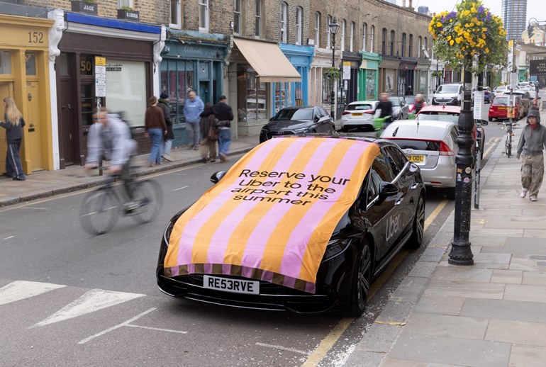 Картинка Uber приравнял такси к пляжным шезлонгам в горячий сезон