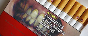 Картинка Табачные компании будут судиться с США, не желая изображать на сигаретах кариес и больные легкие