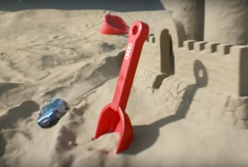 Картинка Audi предлагает всем желающим виртуальные гонки в настоящей песочнице